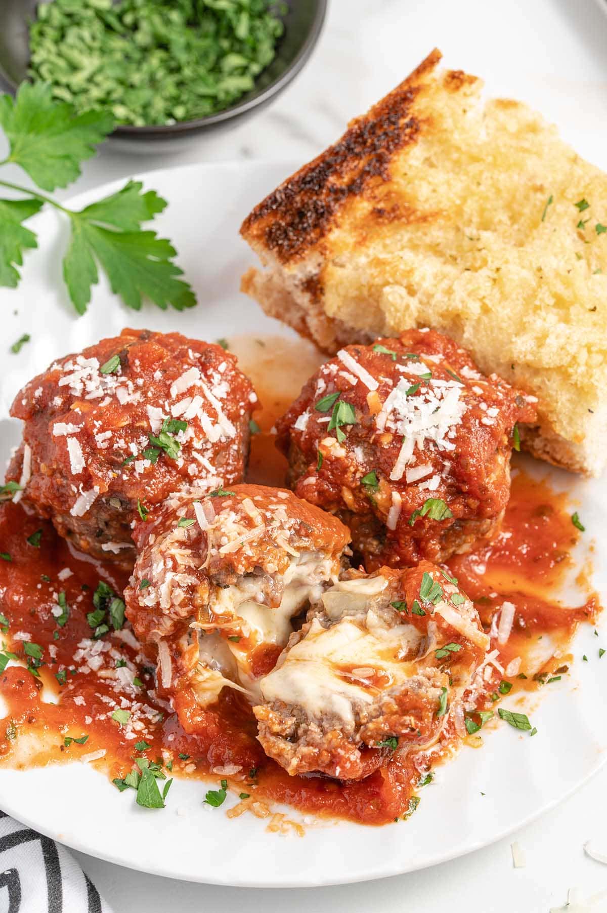 showing the inside of Cheese Stuffed Meatballs