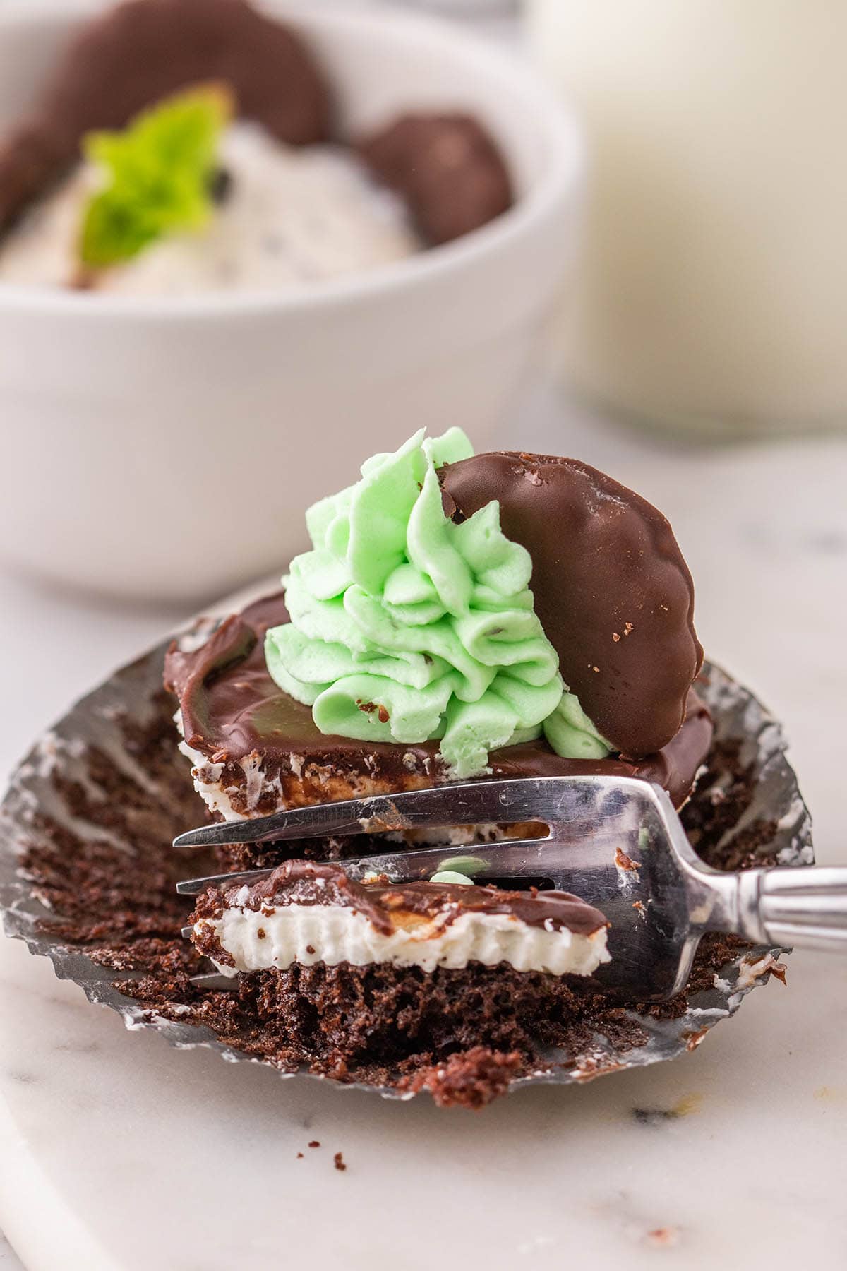 eating Thin Mint Cupcakes using a fork.