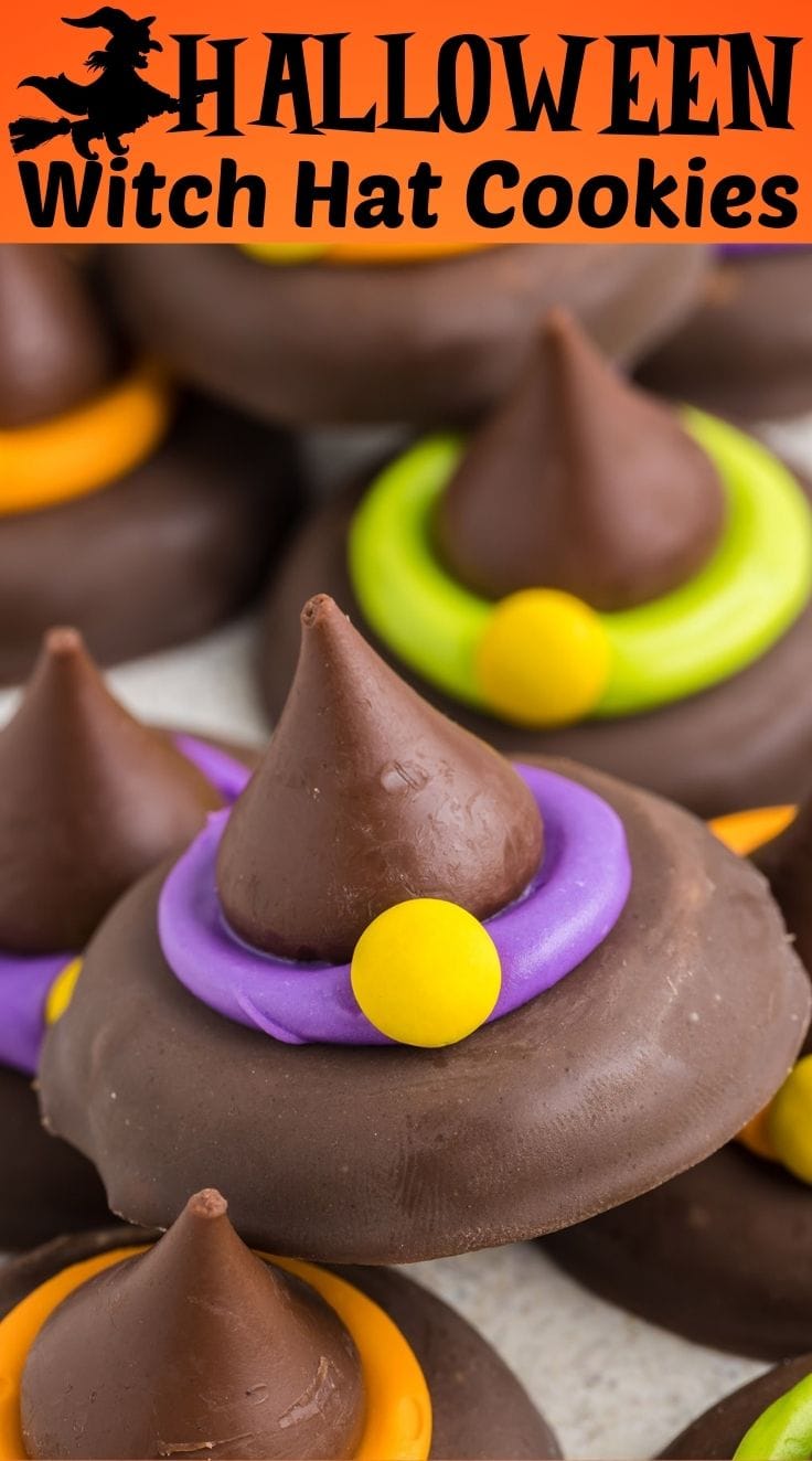 Close up of Witch Hat Cookies decorated with kisses chocolate and colorful frosting