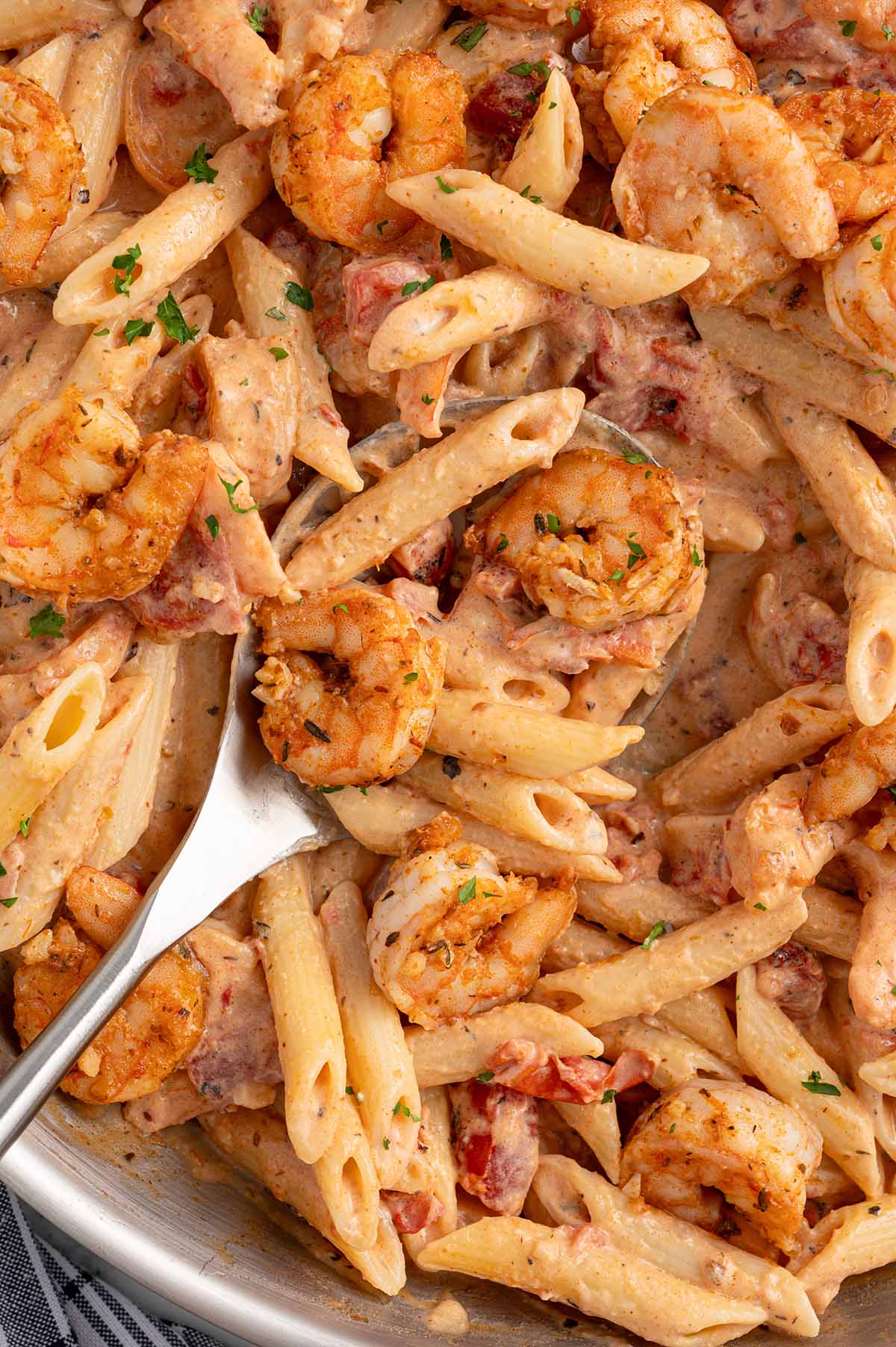 cajun shrimp pasta in a skillet. 