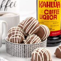 Kahlua Balls in a bowl and kahlua liquor bottle at the background.