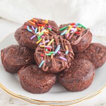 a couple of Brownie Bites with sprinkles on top.