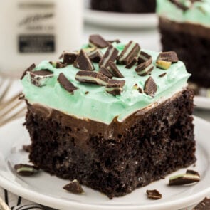 Chocolate Mint Poke Cake sprinkled with crushed mint chocolate candy.