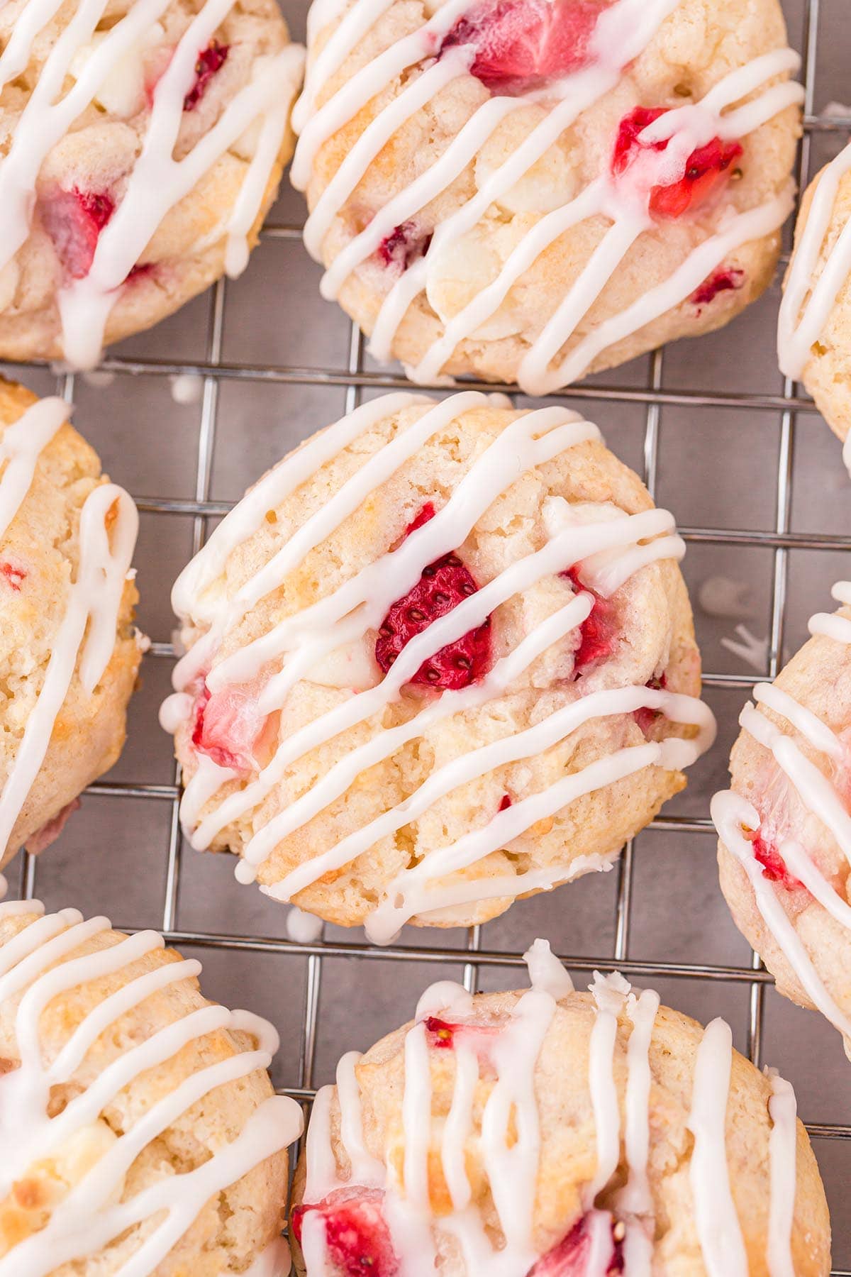 Strawberry Shortcake Cookies on top of a cooling rack.