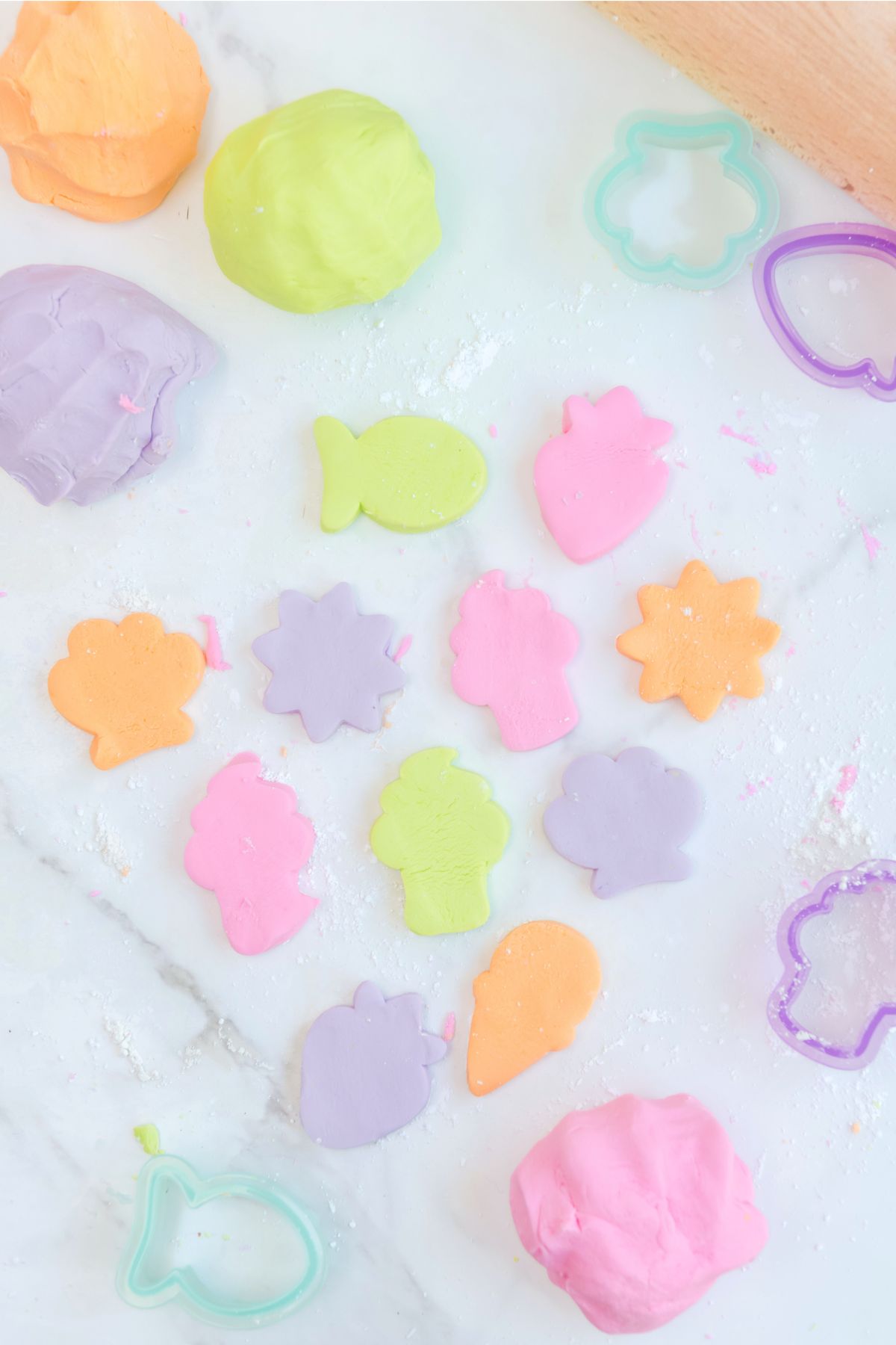colorful playdough cut into different shapes.