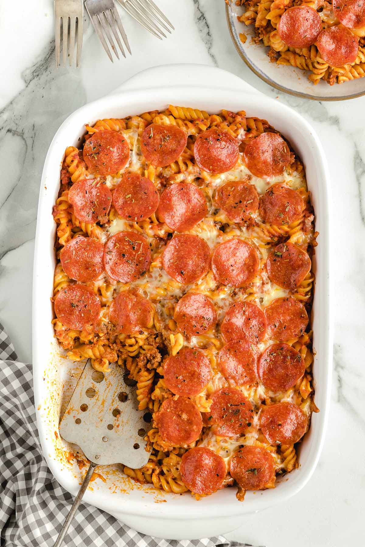 pizza casserole with spatula on the side.