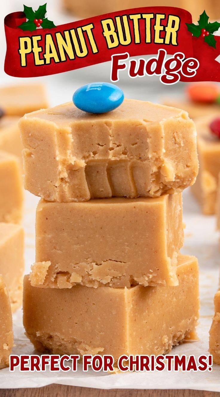 3 pieces of Peanut Butter Fudge stacked on top of each other with blue M&M on top