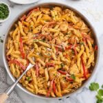 Cajun chicken pasta in a skillet.