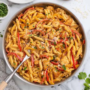 Cajun chicken pasta in a skillet.