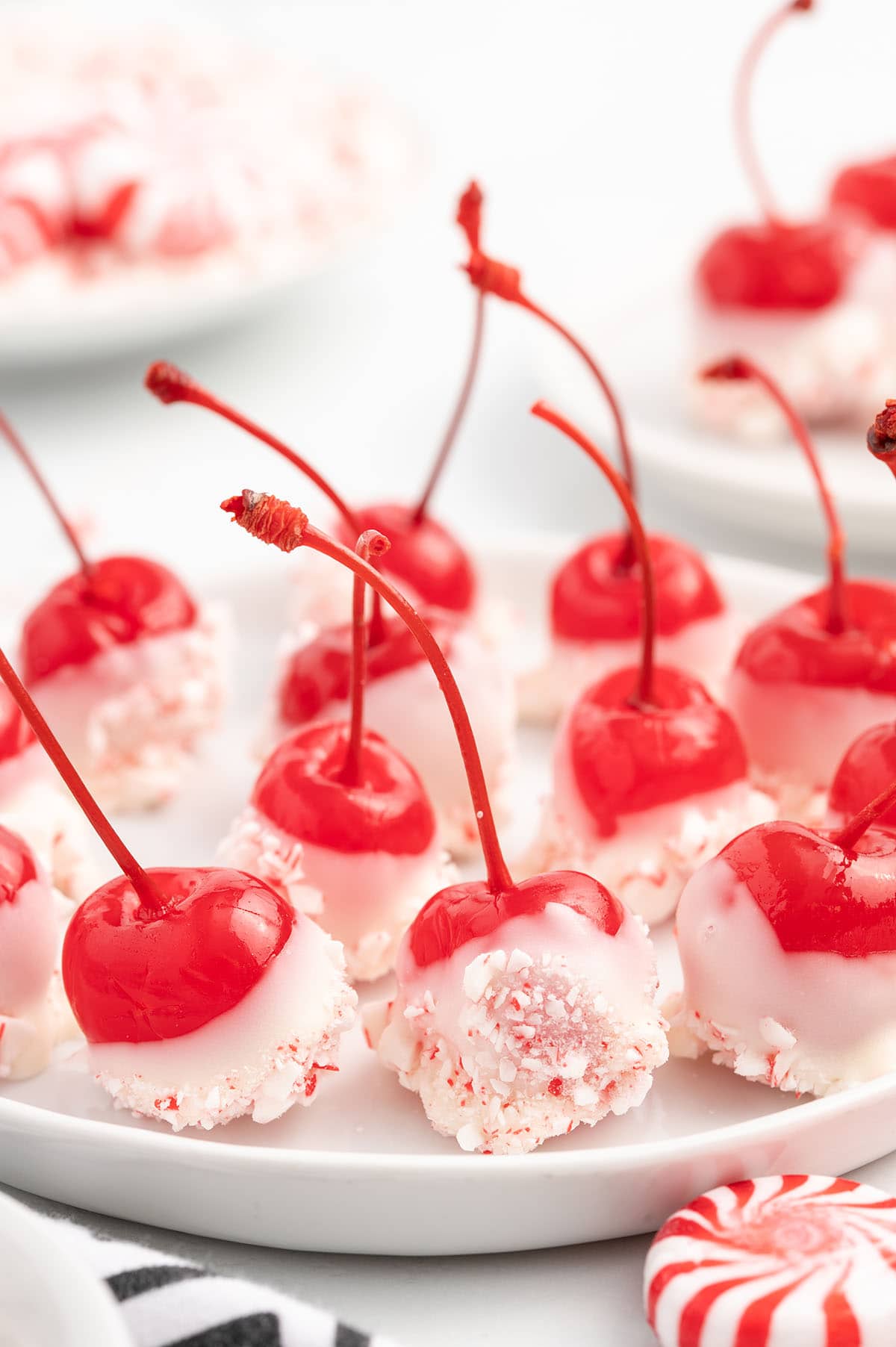 Christmas Cherry Bombs on a white plate.