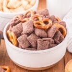 Brownie Batter Puppy Chow in a white bowl.