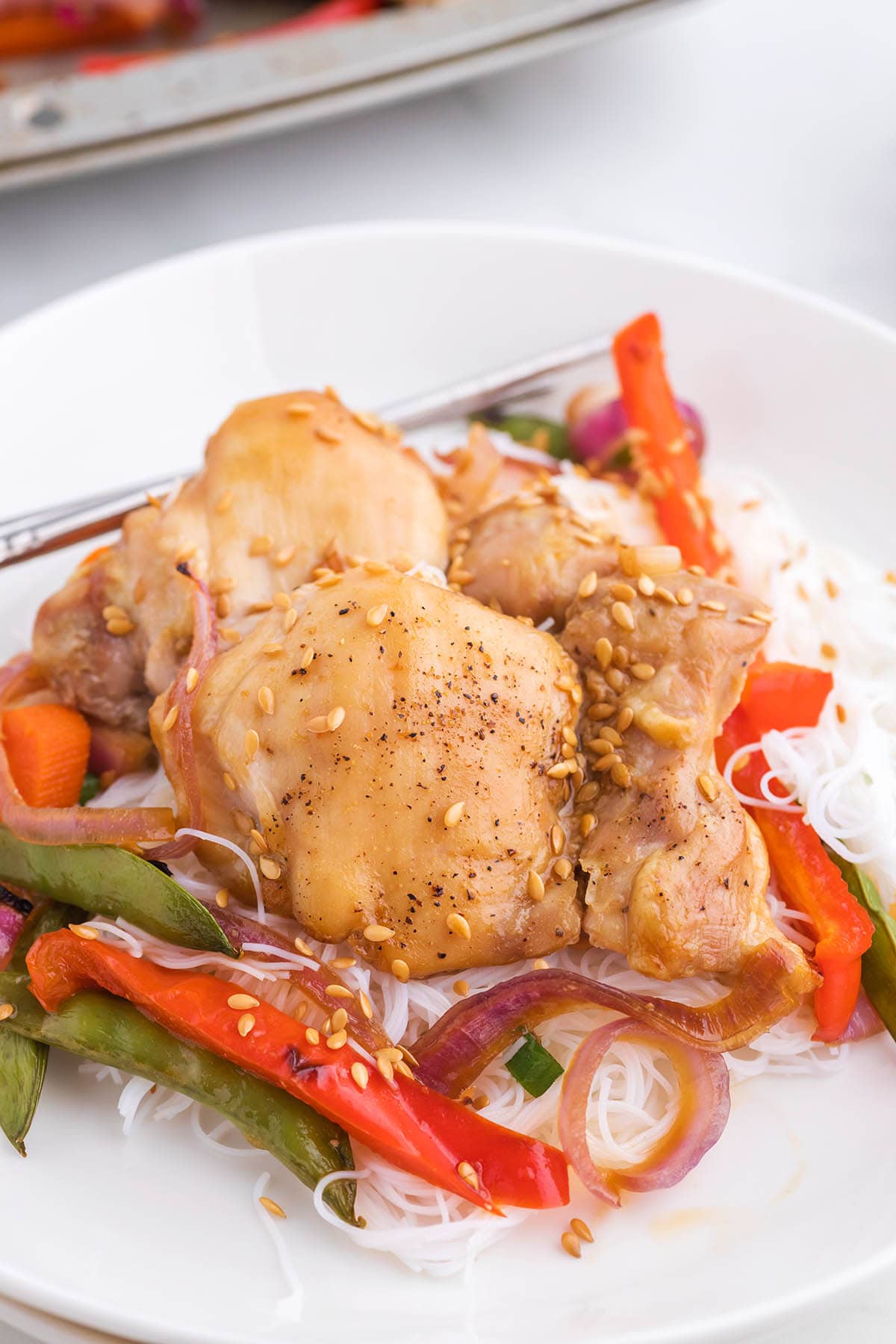 Sheet Pan Asian Chicken on a white plate.