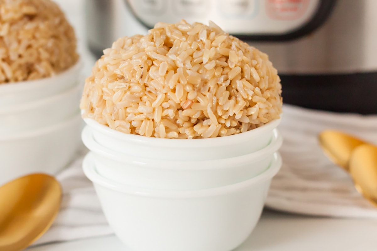 instant pot brown rice in a white bowl.