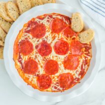 cheese pizza dip with 2 slices of bread.