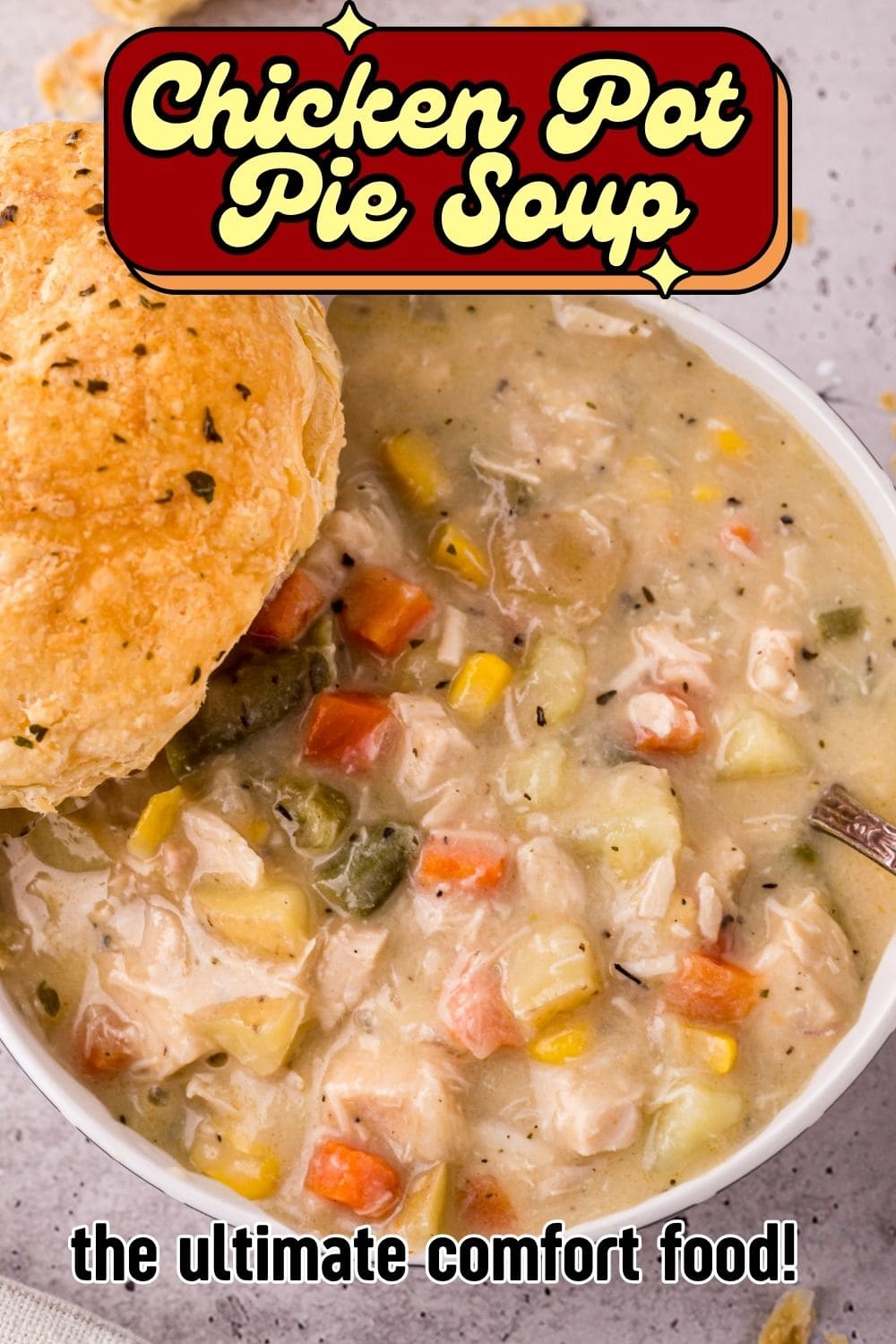 Top view of hearty Chicken Pot Pie Soup served in a white bowl
