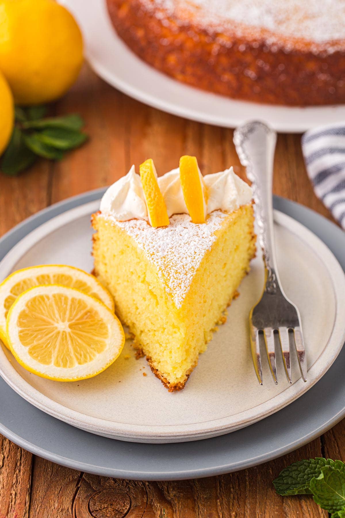 Lemon Ricotta Cake with whipped topping.