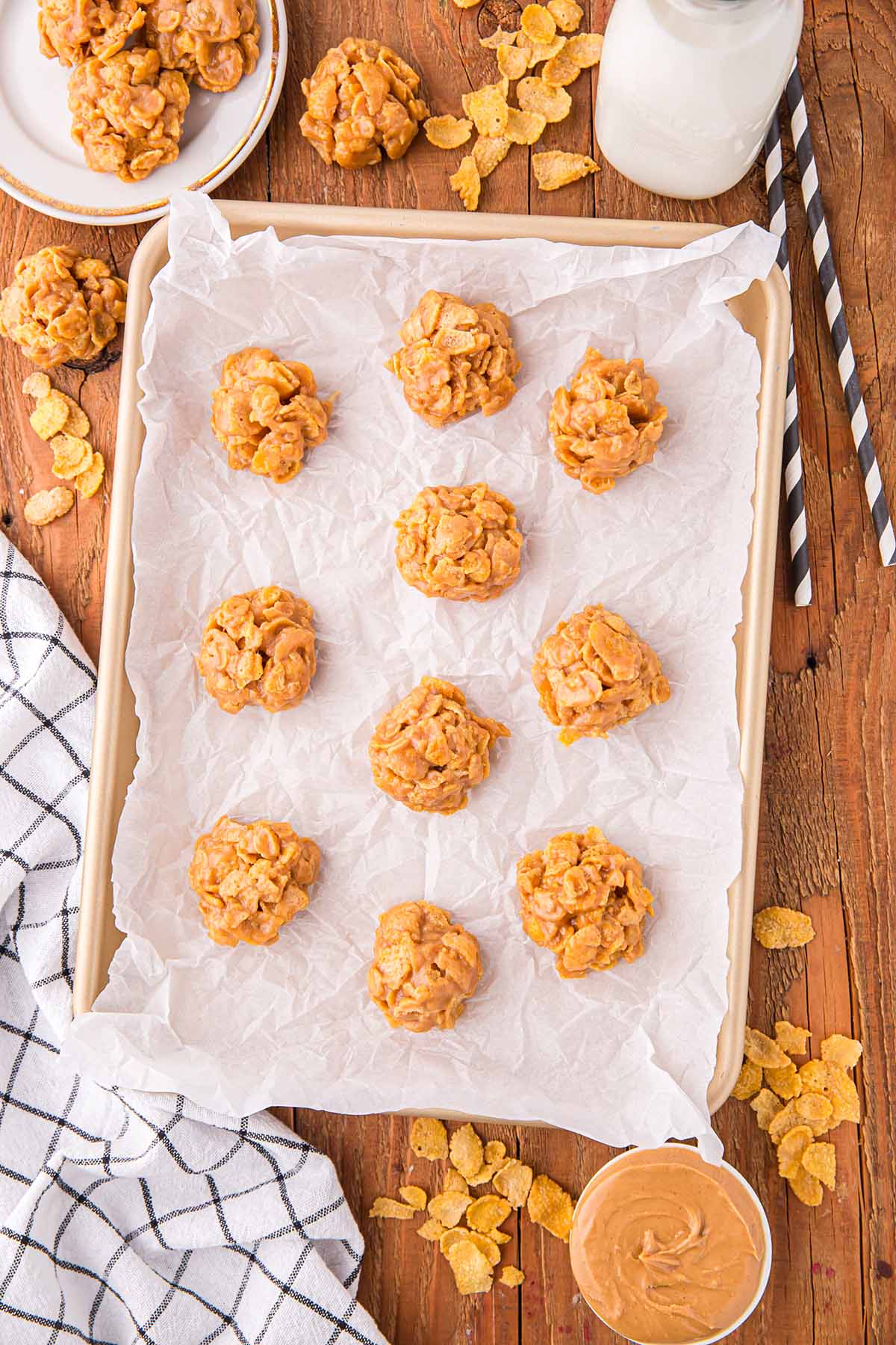 a couple of cornflake cookies in baking sheet.