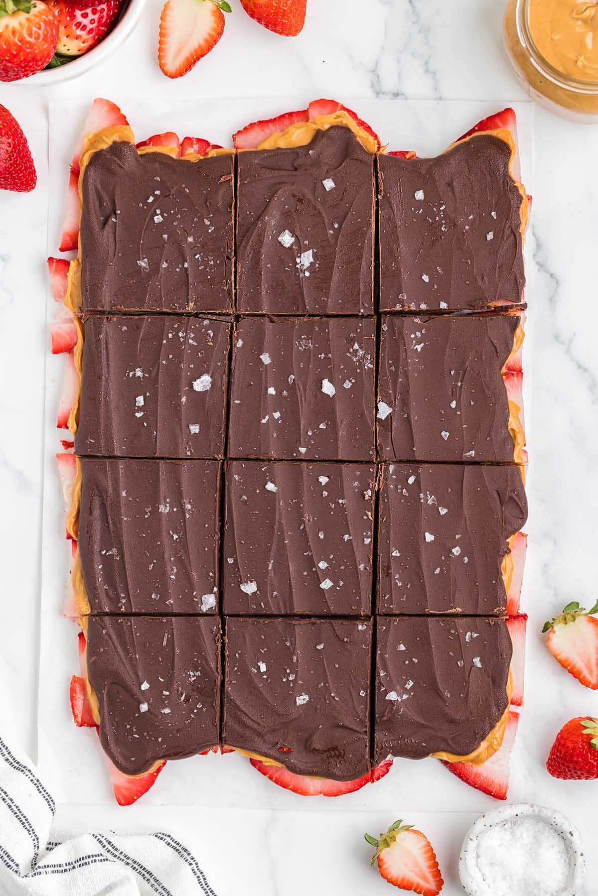 Strawberry Peanut Butter Bark cut into squares.