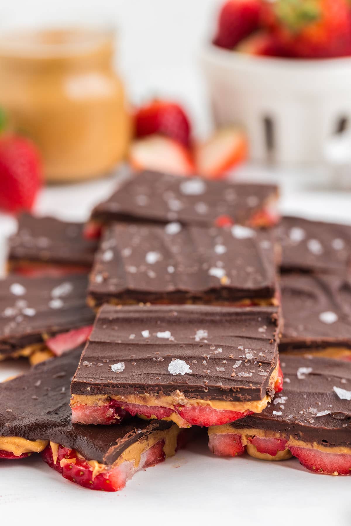 Strawberry Peanut Butter Bark scattered on the table.