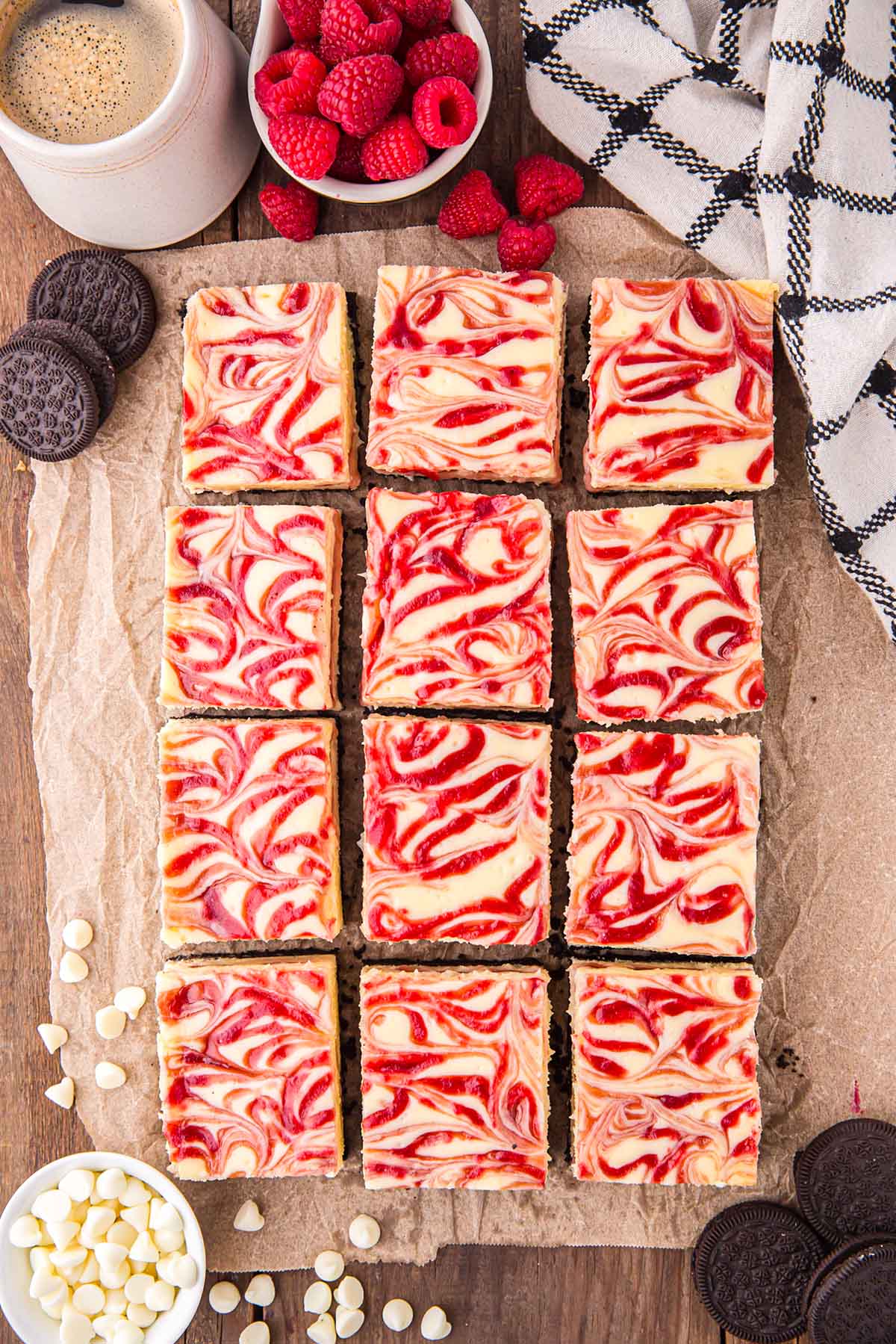 White Chocolate Raspberry Cheesecake Bars cut into squares.