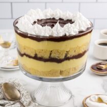 Boston Cream Pie Trifle garnished with whipped topping.