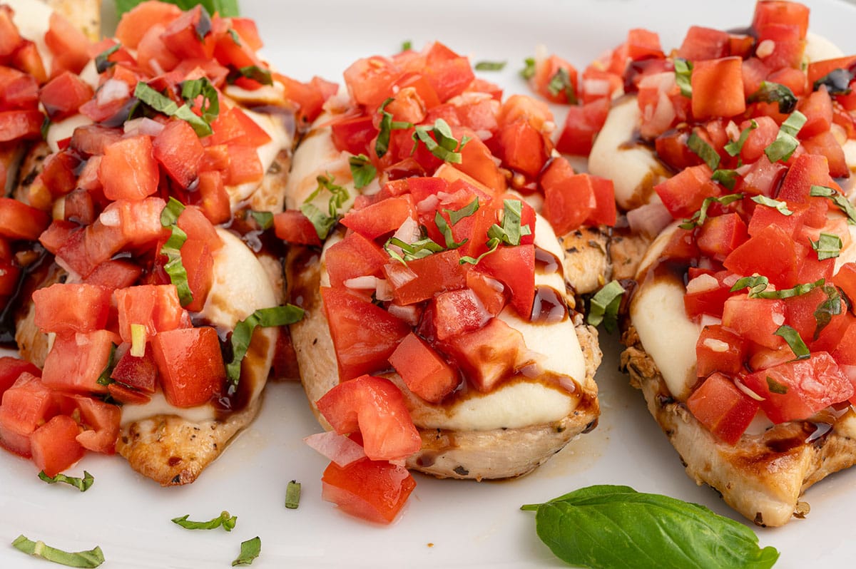 Bruschetta chicken on a plate.