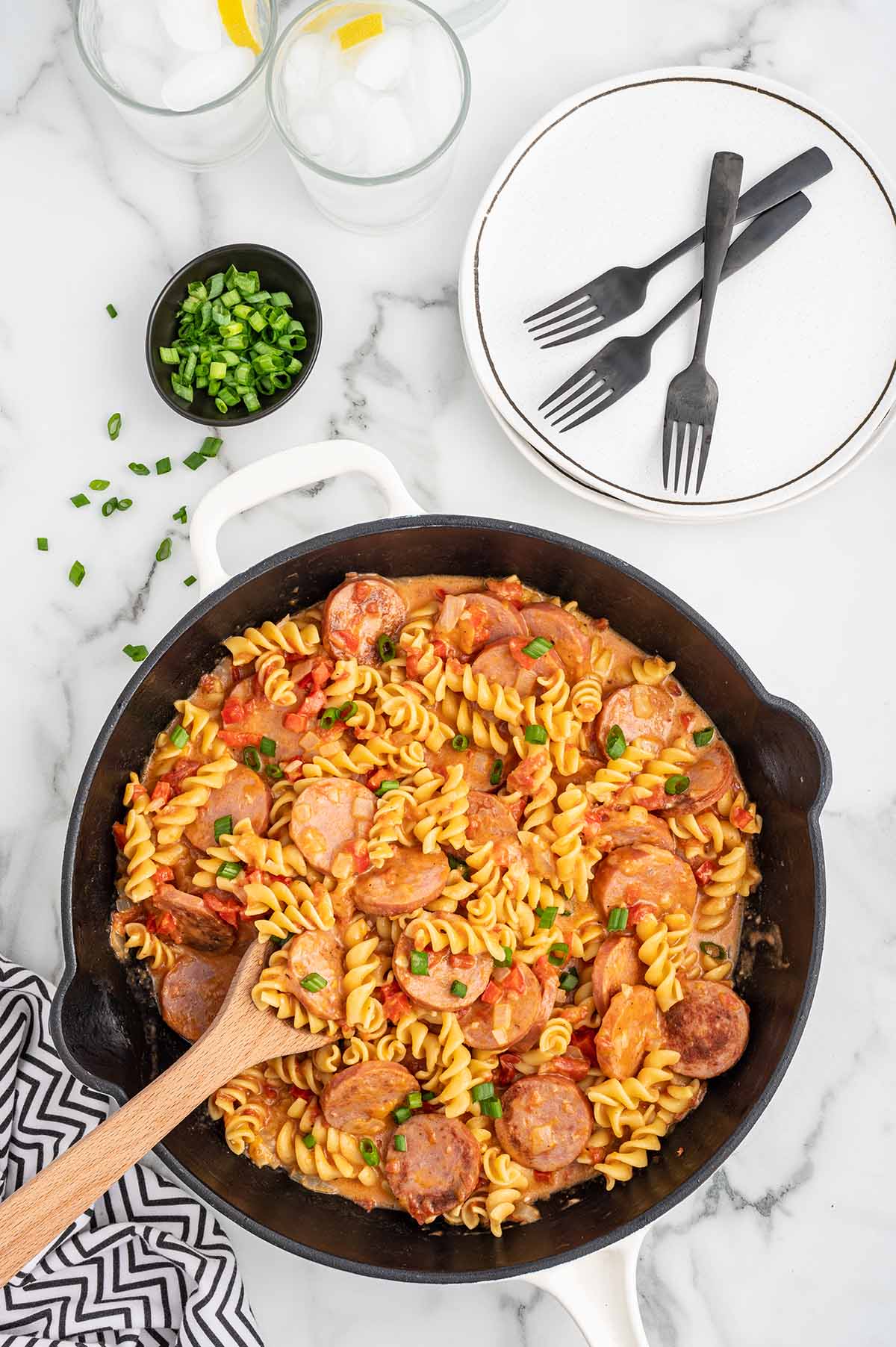 Italian Sausage Pasta in a skillet and placed on the table.