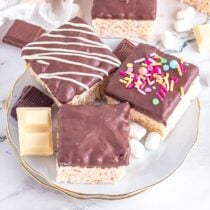 Chocolate Dipped Rice Krispie Treats served on the plate.
