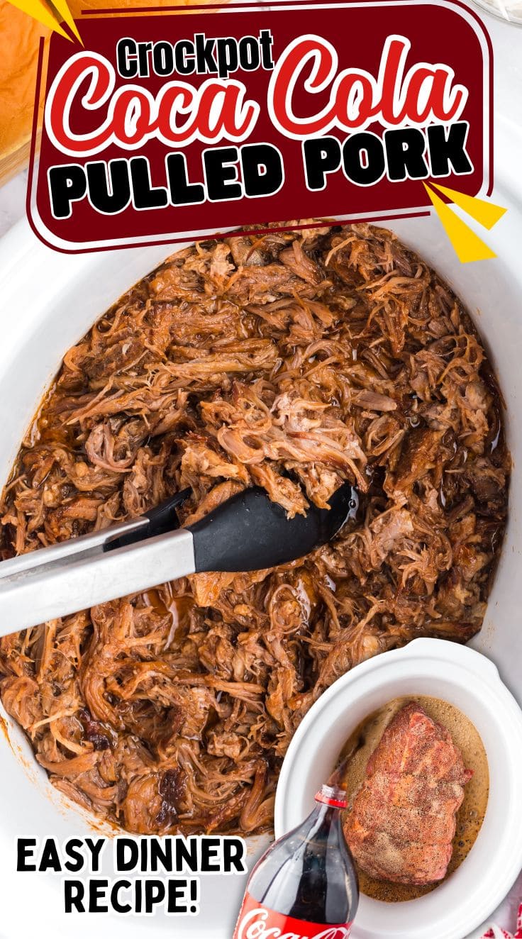 Top view of A tong grabbing Crockpot Coca-Cola Pulled Pork from a white crockpot