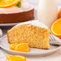 a slice of Orange Cake on the plate.