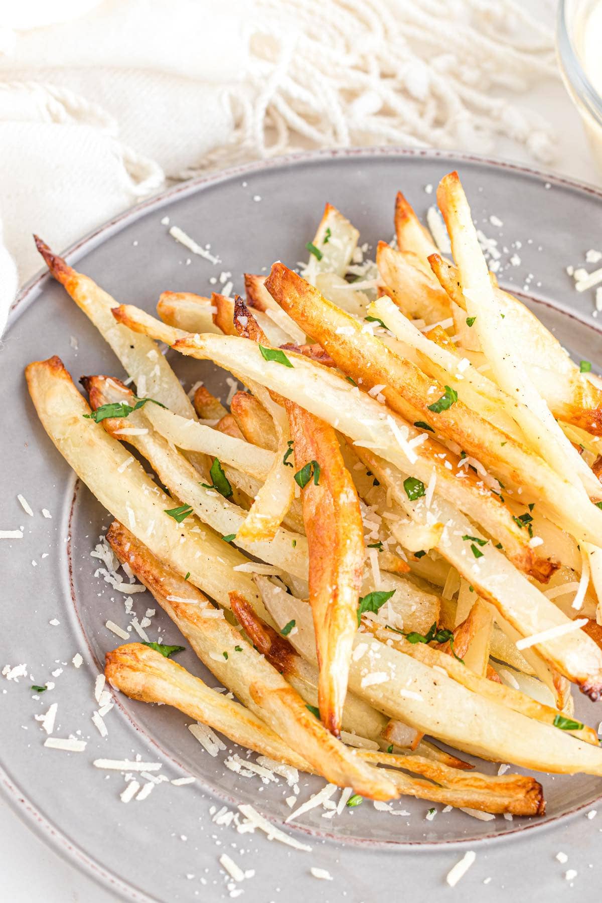 truffle fries on a plate.