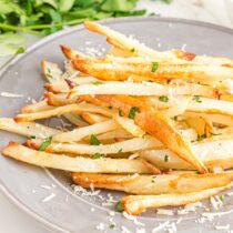 Truffle Fries garnished with parmesan and parsley.