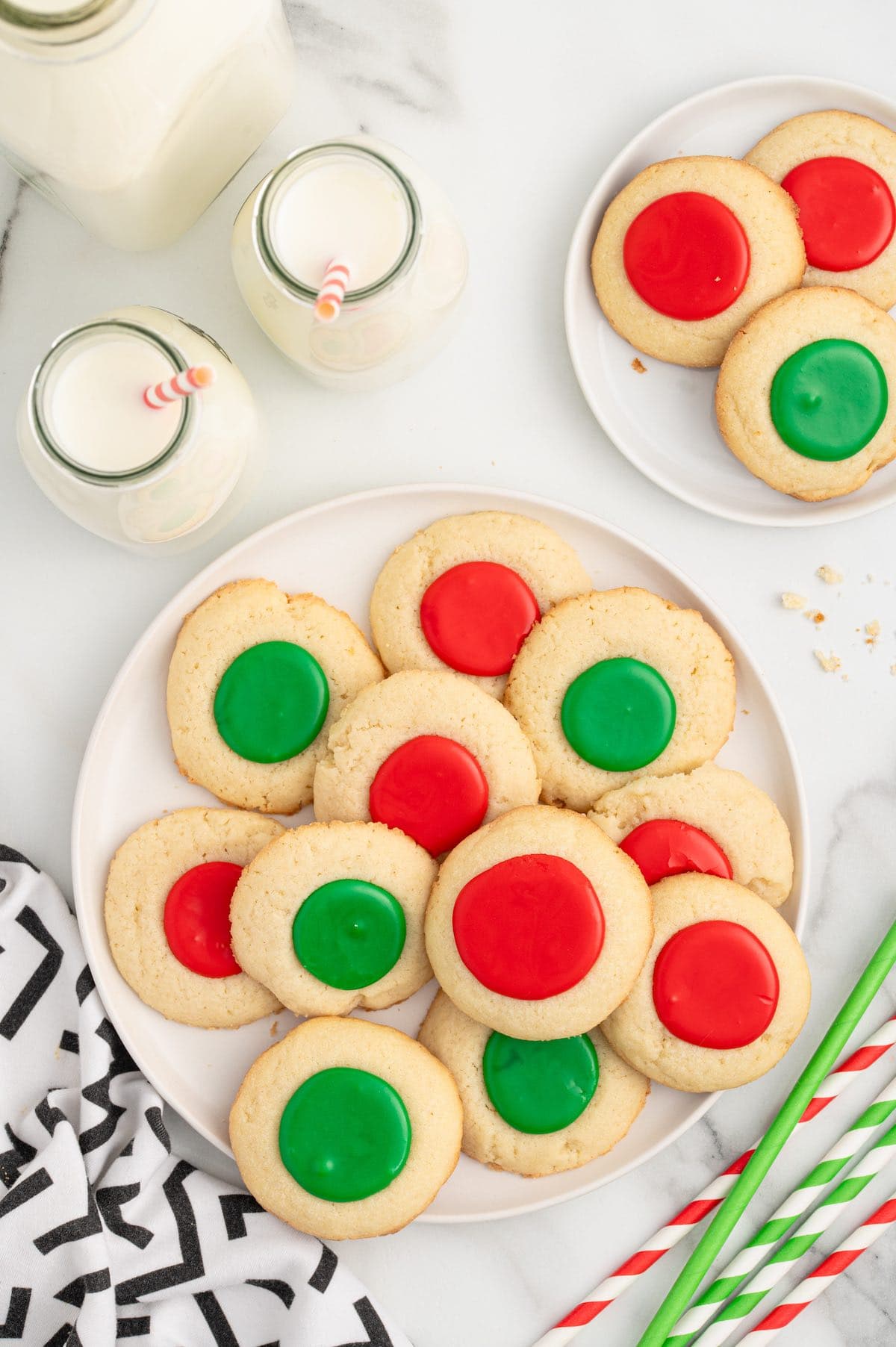 thumbprint cookies with red and green icing.