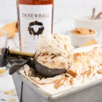 use ice cream scoop to scoop Skrewball Whiskey Ice Cream.
