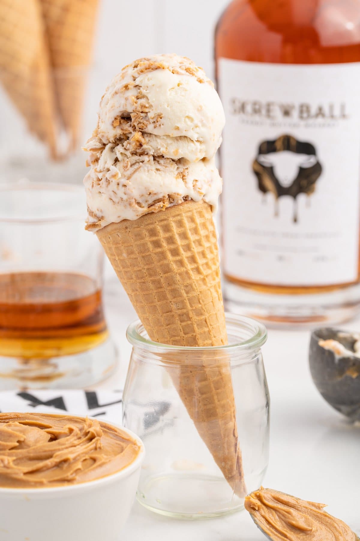 Skrewball Whiskey Ice Cream in a cone.