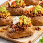 taco potatoes on top of baking sheet.