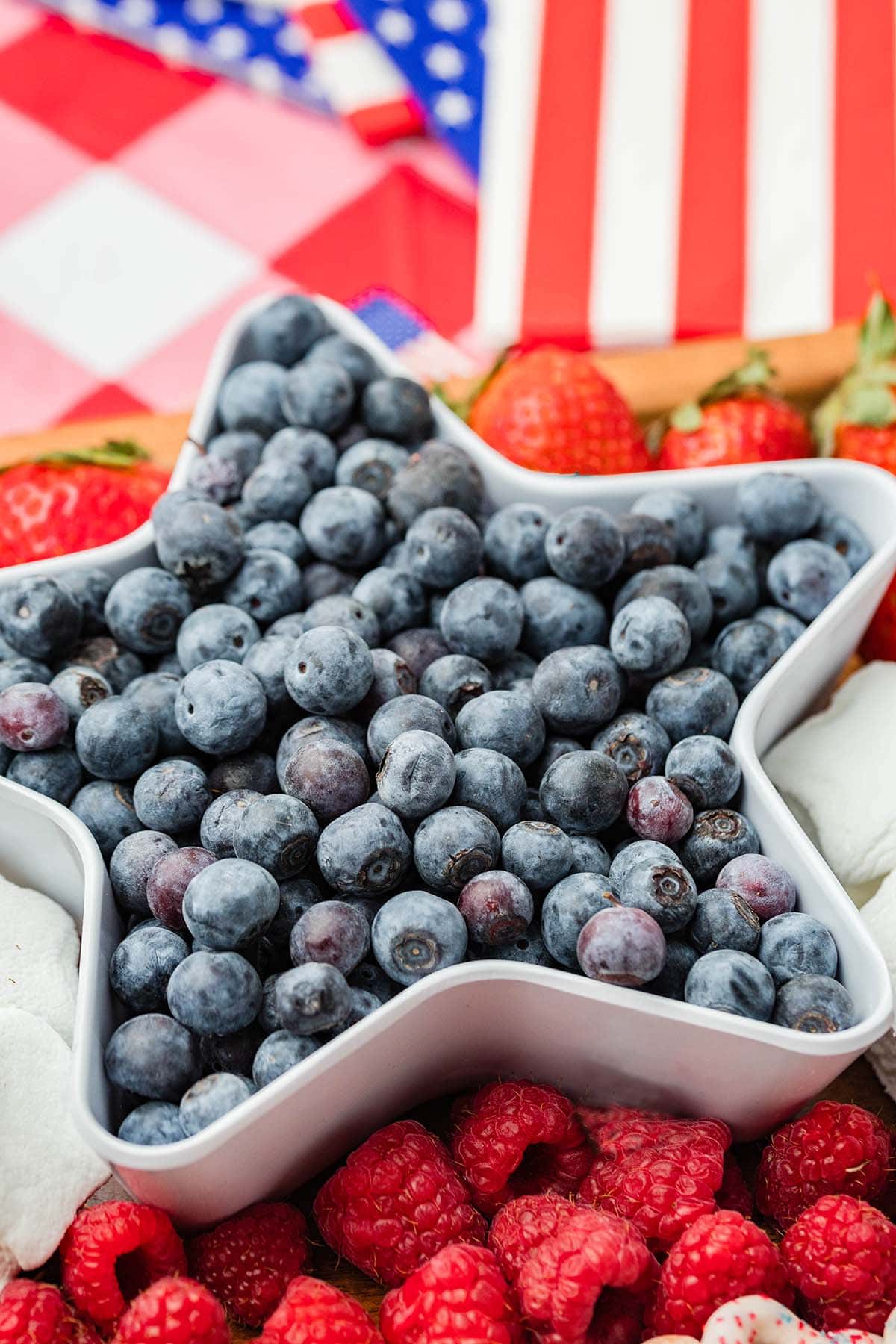 4th of July Fruit and Snack Tray with blueberries in a star shaped bowl.