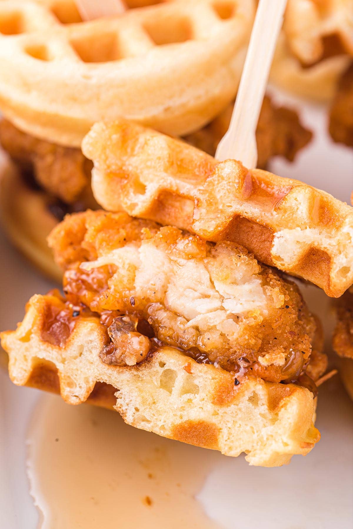 bitten a piece of Chicken and Waffle Sliders.