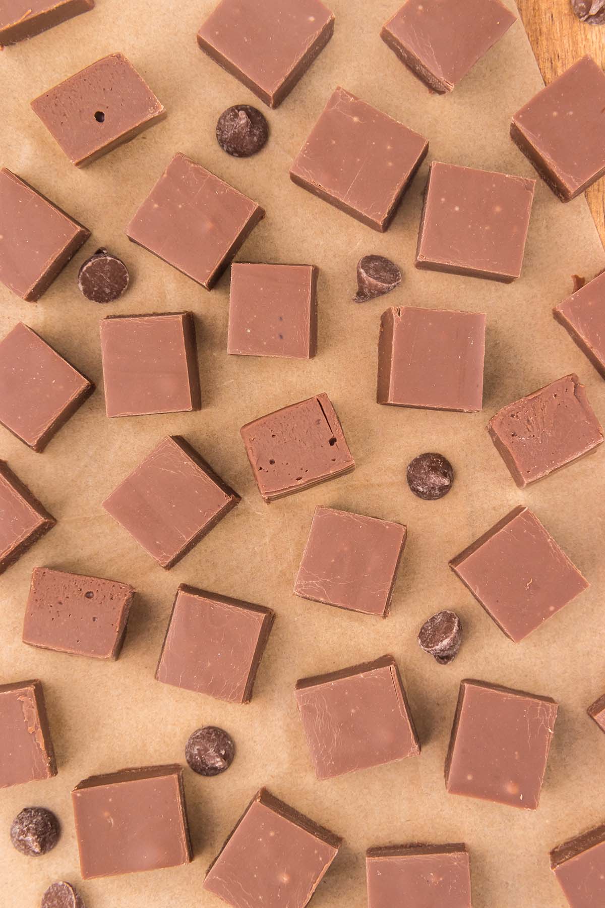 Kahlua Fudge scattered on the table with chocolate chips.