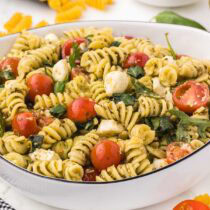 Pesto Pasta Salad in a large mixing bowl.