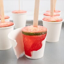 dirty shirley popsicles inside paper cup.