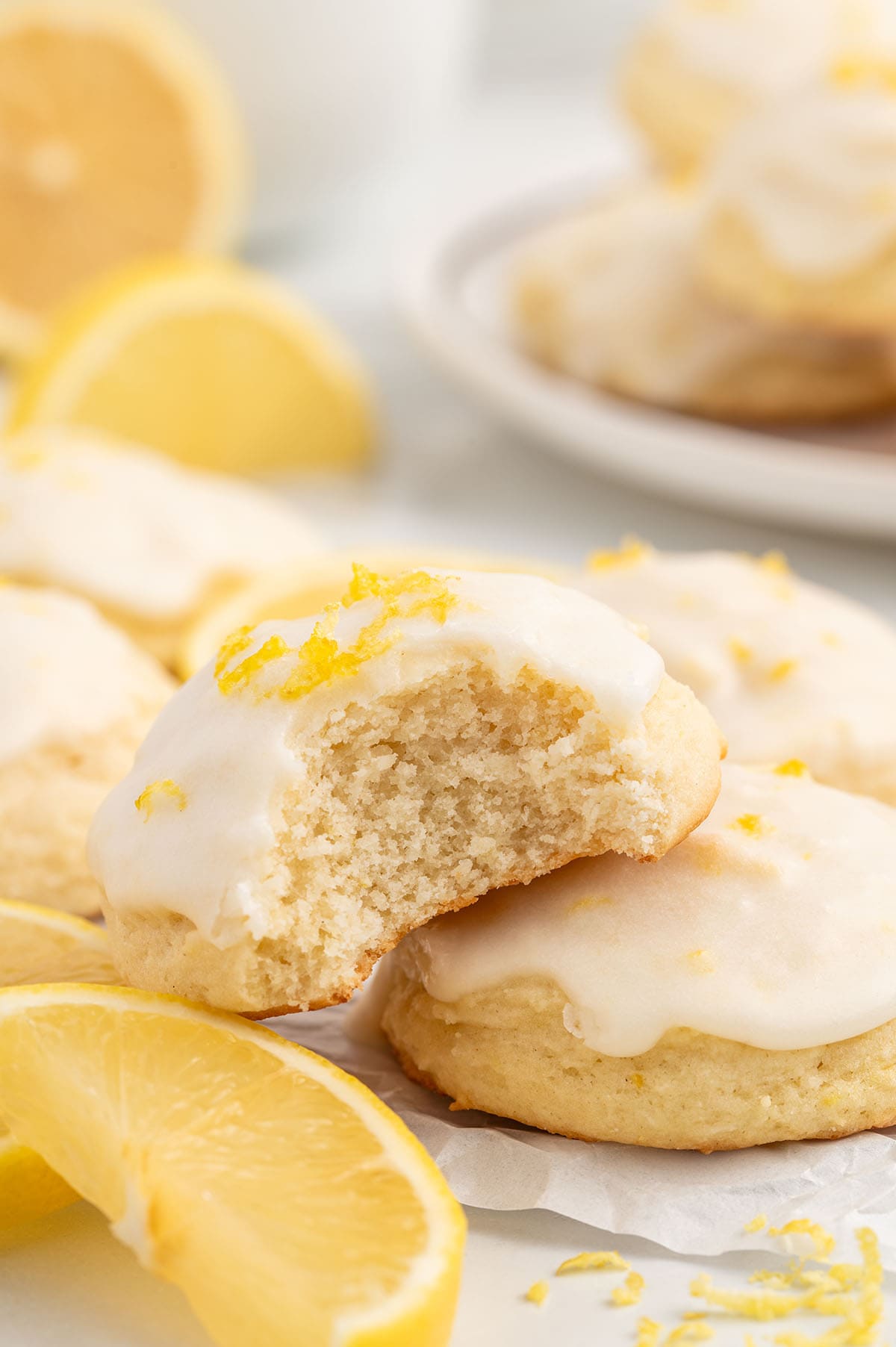 a couple of Lemon Ricotta Cookies with glaze on top.