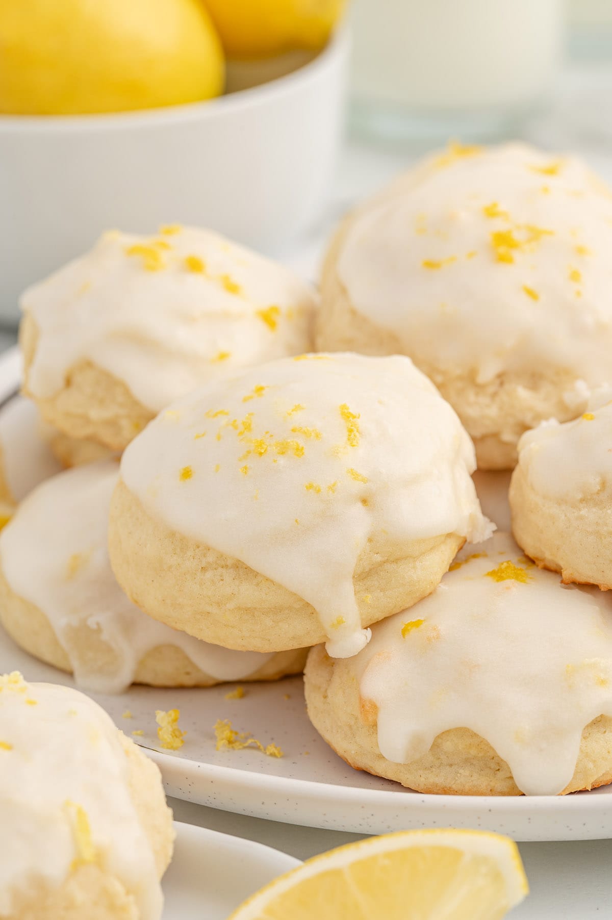 a couple of Lemon Ricotta Cookies stacked up on the plate.
