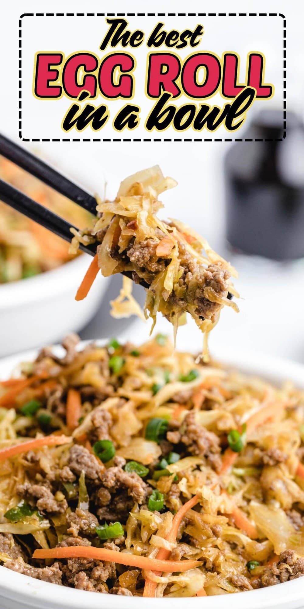 A pair of chopsticks lifting egg roll in a bowl with ground beef and tender vegetables.