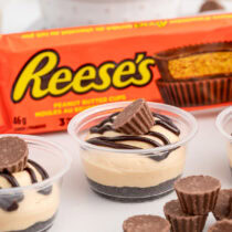 Chocolate Peanut Butter Dessert Cups with a package of reese's behind it.