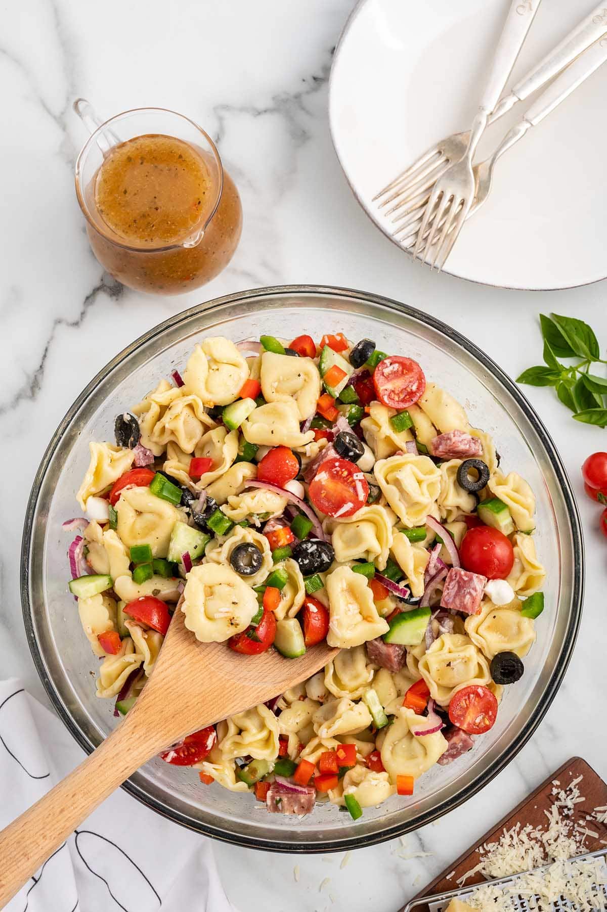 a bowl of Tortellini Pasta Salad on the table.