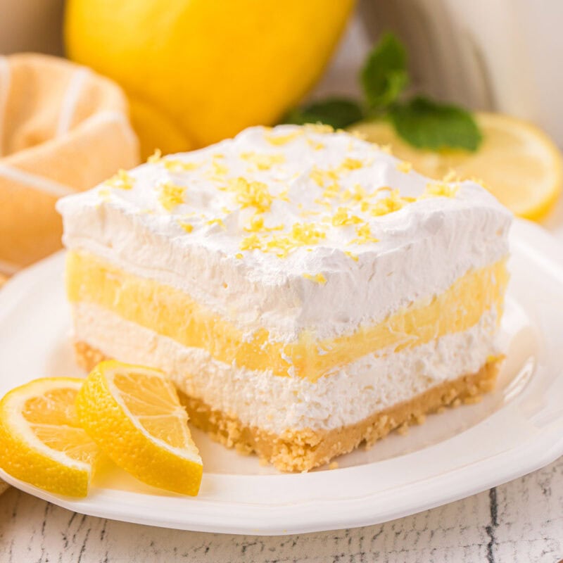 Lemon Lasagna on a plate with lemon slices.