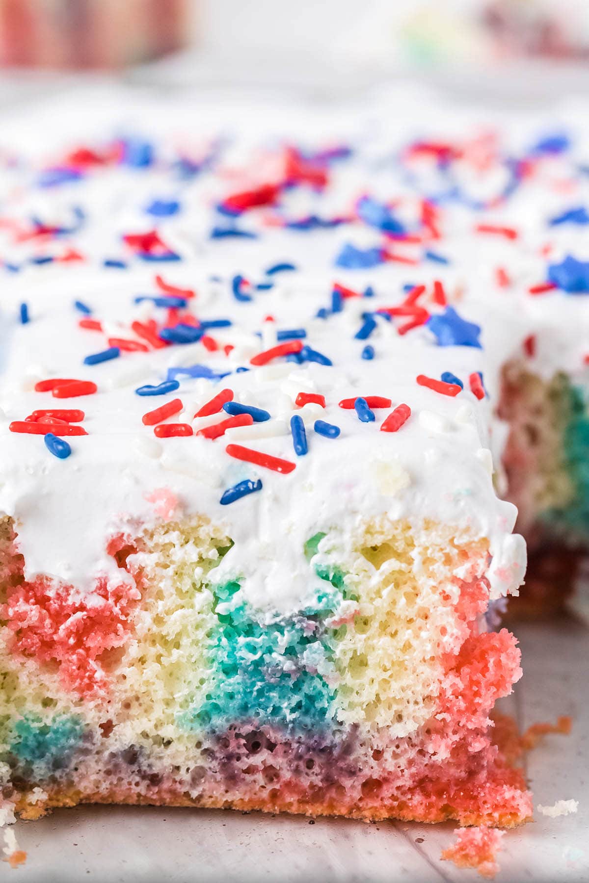 poke cake with red and blue jello filling. 