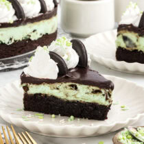 one slice of Thin Mint Cheesecake with whipped topping and cookies.