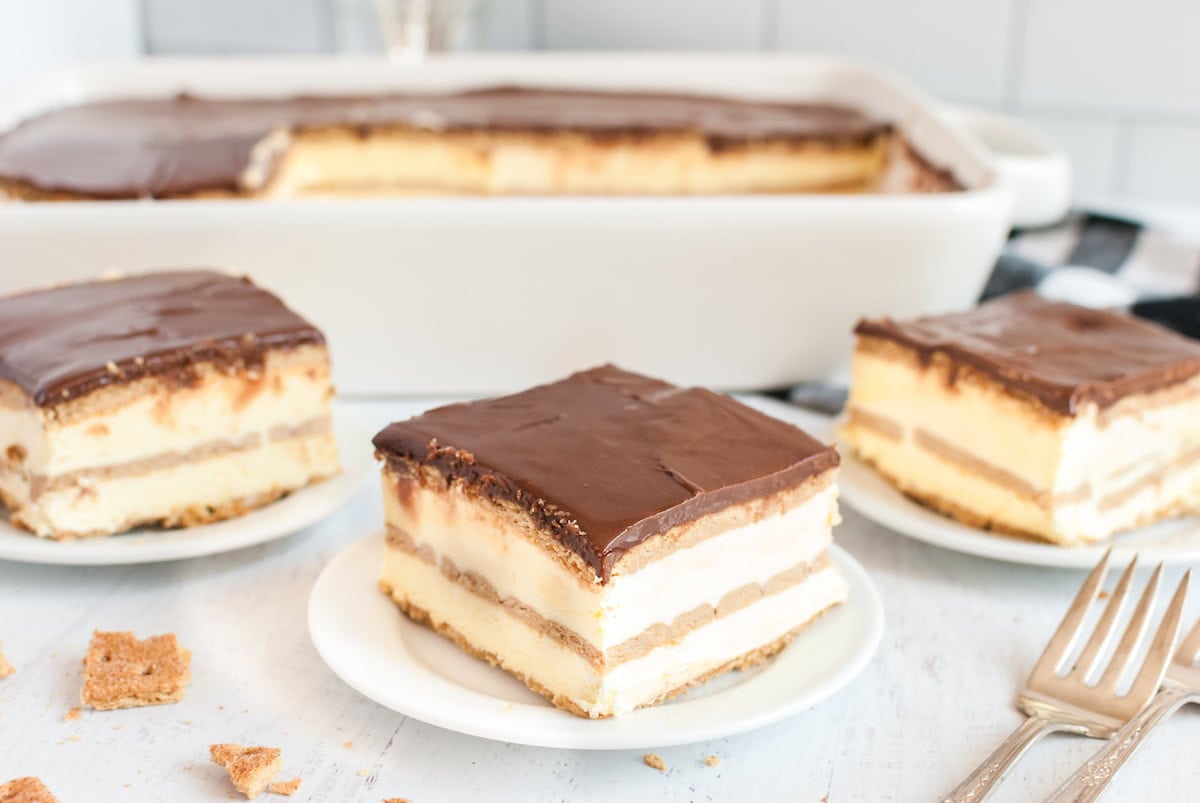 a couple slices of eclair cake on a plate. 
